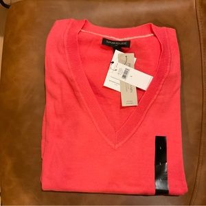 Banana Republic pink v-neck sweater, with buttons on sleeves.